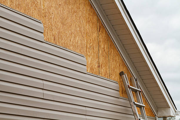 Professional Wood Siding technician working in Ellicott City, MD